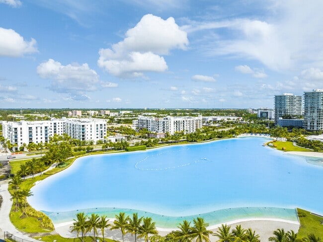 Wake up to waterfront views and a vibrant community designed around outdoor living. - SoLé Mia Rentals Apartments