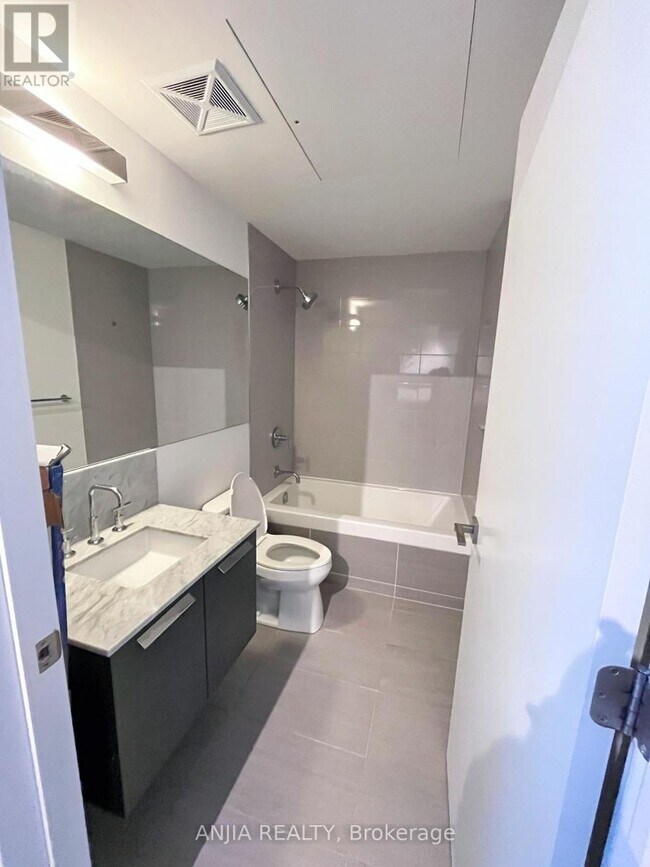 Building Photo - 50 Charles St E