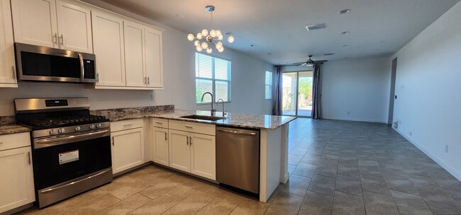 Kitchen & Family Room - 2192 W Sierra Sunset Trl