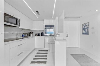 Building Photo - 6301 Collins Ave
