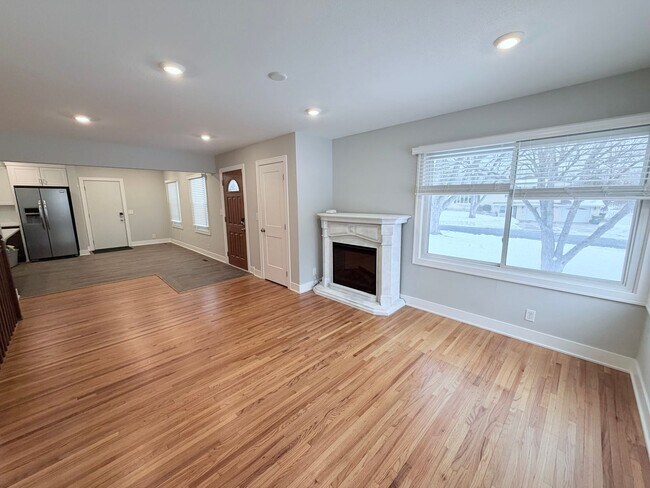 Building Photo - Spacious 4-Bedroom Home with Pond Views & EV-Ready Garage – Bloomington!!