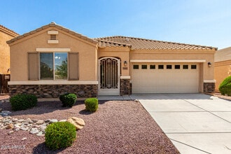 Building Photo - 9883 W Harmony Ln