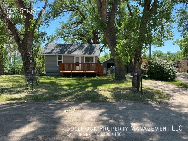Building Photo - Beautifully updated house with 2 decks and...