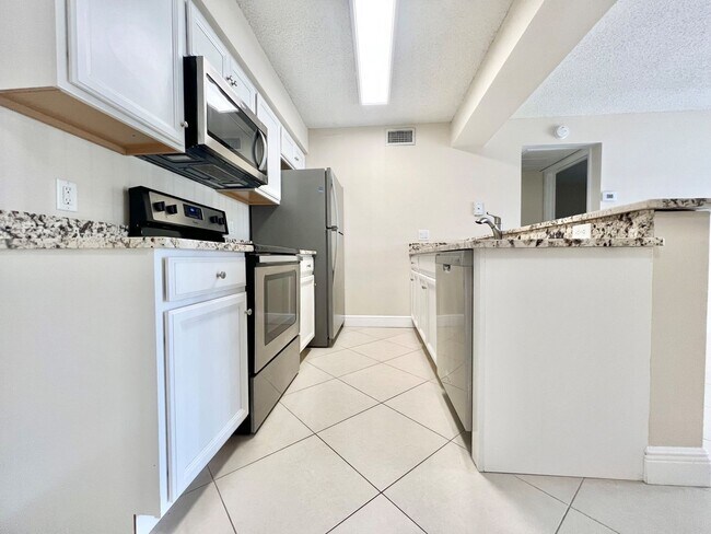Building Photo - Mystic Gardens 5309-904