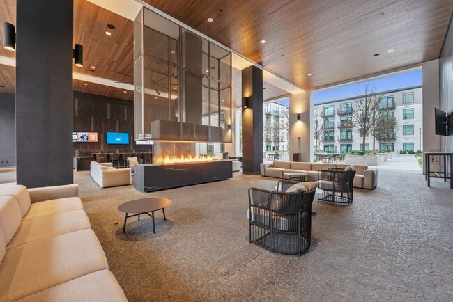 Hangout at The Piazza, our covered outdoor lounge including televisions, fireplace and lounge seating. - The Sterling at Regent Square
