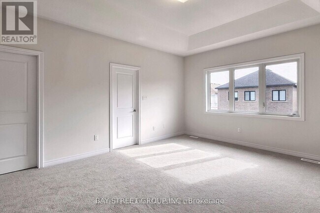 Photo du bâtiment - 1296 Klondike Dr