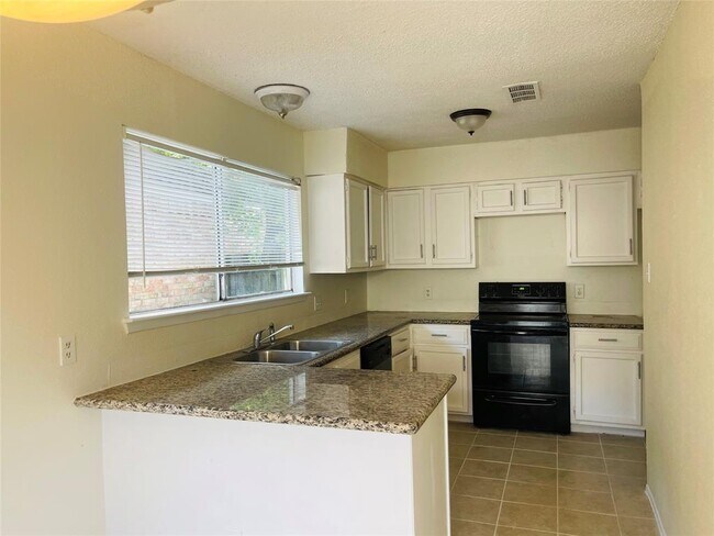 Building Photo - 8907 Kindlewood Dr