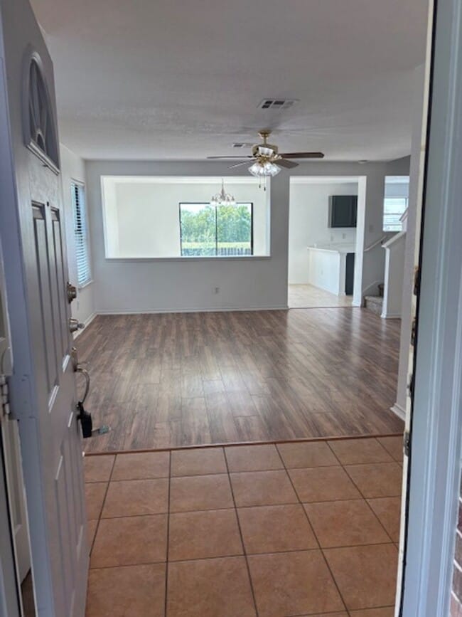 Building Photo - Move-In Ready 4-Bedroom Home with New Floo...