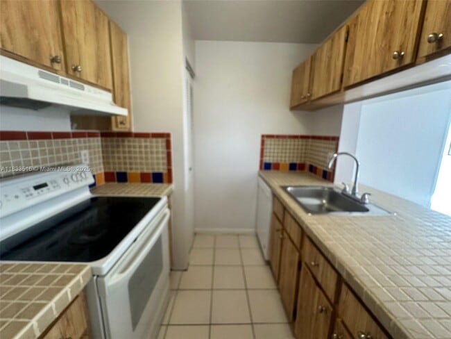 Foto del edificio - 9808 Hammocks Blvd
