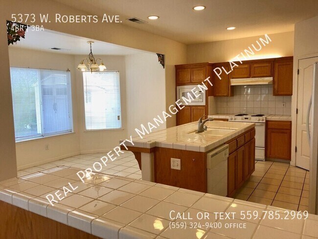 Foto del edificio - 5373 W Roberts Ave