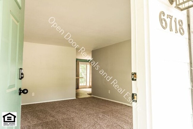 Building Photo - 6718 Raintree Rd