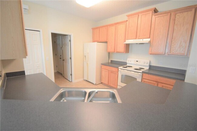 Building Photo - 4825 Aguila Pl