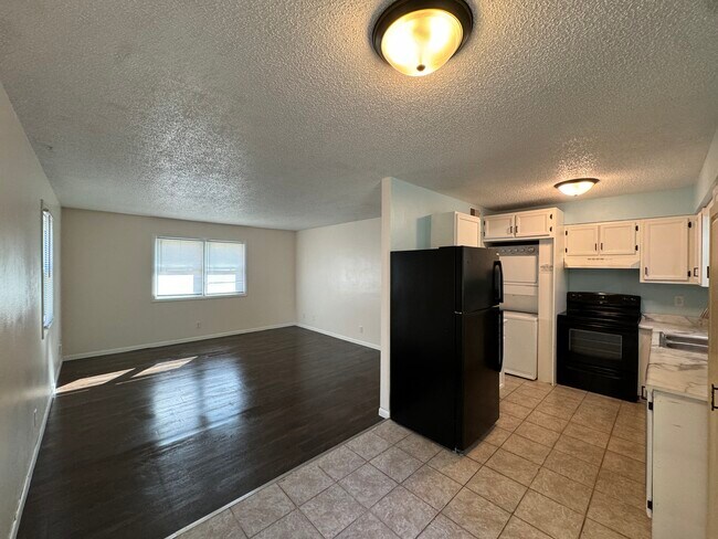 Living area and kitchen - 205 Wellons Dr