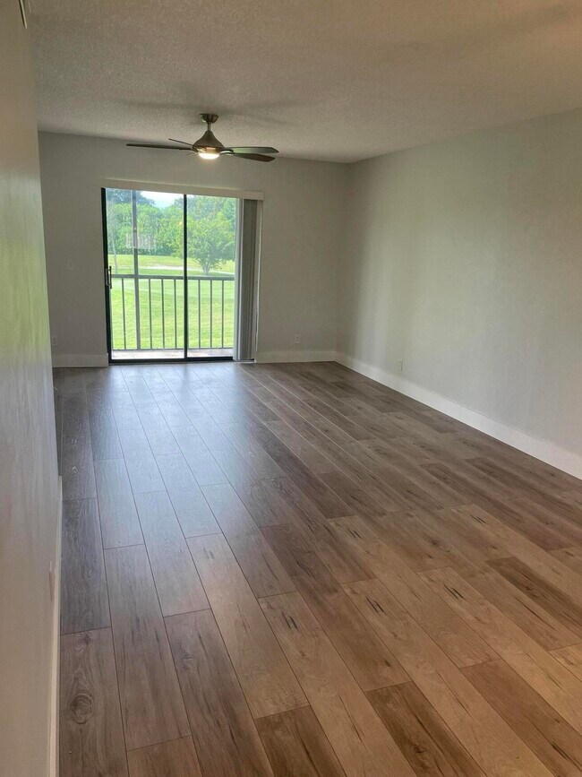 Building Photo - 7101  Golf Colony Court 201 Lake Worth Fl ...