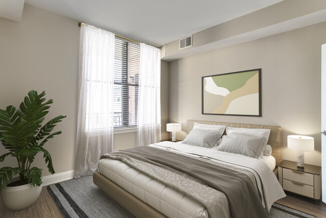 Renovated Package II bedroom with hard surface flooring - Avalon at Gallery Place