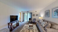 Located at 20 Church Rd in Maple Shade, NJ, this two-story residence offers a practical and comfortable layout across two floors. The main level is home to a bright, carpeted living room that serves as the heart of the home, featuring a sliding glass door that invites natural light and provides access to an outdoor area with views of surrounding greenery. The open flow connects the living room to the kitchen, which is outfitted with light wood cabinetry, granite-look countertops, a gas range, and wood-look flooring — offering both functionality and a clean aesthetic. The upper level houses two bedrooms, including a generously sized primary bedroom with multiple windows, soft carpet flooring, and a dedicated closet. The second bedroom also features carpet flooring and its own closet, with an additional closet providing ample storage throughout. A single full bathroom serves the home, appointed with tile flooring, a wood vanity with storage, and a shower-tub combo. A staircase connects the two floors, completing this well-organized and efficiently designed residence in a convenient New Jersey location.
