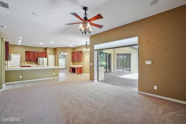 Building Photo - 4 br, 3 bath House - 24728 Calusa Blvd.
