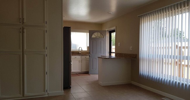 Building Photo - 4 br, 2 bath House - 11275 E 23rd Avenue