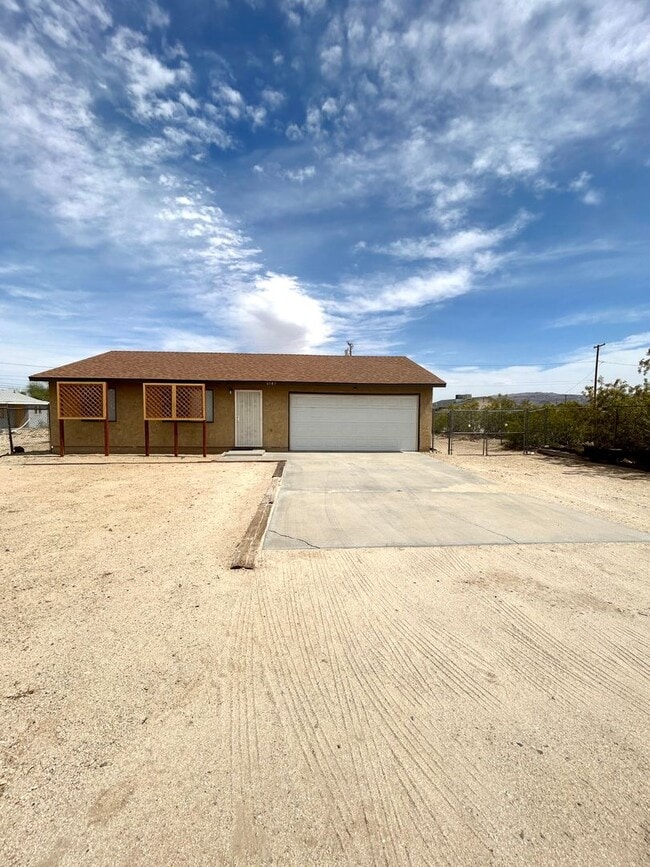 Building Photo - 6547-6549 49 Palms Ave