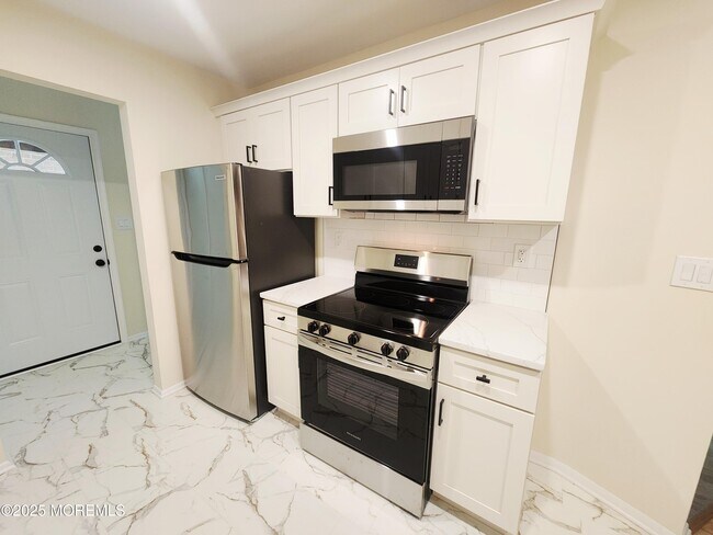 Foto del edificio - 38 Meadow Green Cir