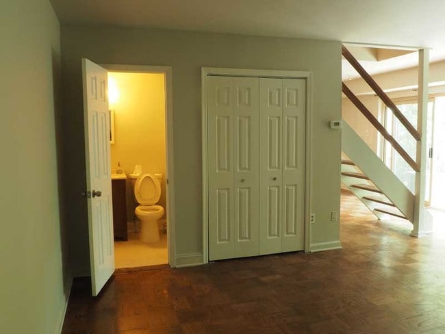 Half bath/laundry off living room - 8704 Manchester Rd