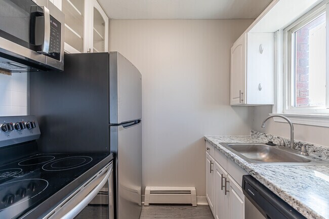 2HAB, 2BA Casa adosada - Cocina - Westwood Court Townhouses
