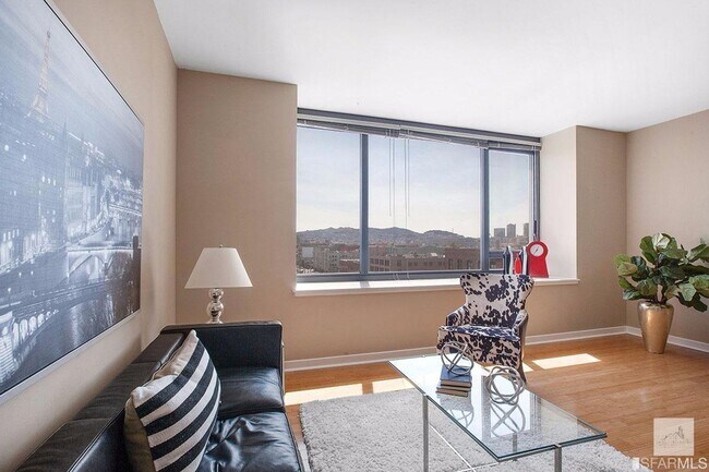 Foto del edificio - Spacious One-Bedroom Elegance in a Luxury Doorman Building with EV Parking