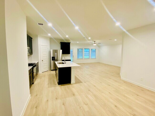 Oen Concept living room/formal dining/kitchen - 4210 Harvest Creek Ct