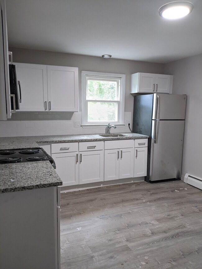 Building Photo - 404 Woodtick Rd