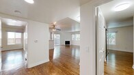 Located at 4610 Fulton Ave in Sherman Oaks, Los Angeles, this single-story 2-bedroom, 2-bathroom home offers a well-designed layout across a comfortable and functional floor plan. Rich wood-look flooring runs throughout, creating a warm and cohesive aesthetic in every room.

The living room serves as the heart of the home, featuring a classic fireplace framed by crisp white trim, a ceiling fan with light fixture, and abundant natural light streaming in through large sliding glass doors and multiple windows. The sliding doors open to an outdoor view, enhancing the sense of openness.

The kitchen is outfitted with white cabinetry, light stone-look countertops, and stainless steel Whirlpool appliances, including a gas range and an over-the-range microwave — ideal for everyday cooking.

The spacious primary bedroom offers generous proportions with clean white walls and continuity of the wood-look flooring. The second bedroom is equally well-appointed and bright. A dedicated closet and connecting hallway add practical storage and circulation.

Both bathrooms feature full tub-shower combinations with white surrounds, wood-look flooring, and vanities with mirrors, maintaining a clean and consistent finish throughout. The overall ambiance is bright, neutral, and move-in ready.