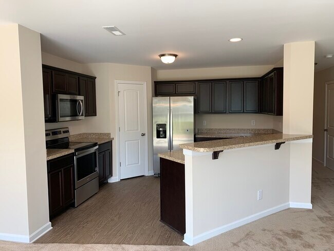 Foto del edificio - 410 Hidden Brook Lane