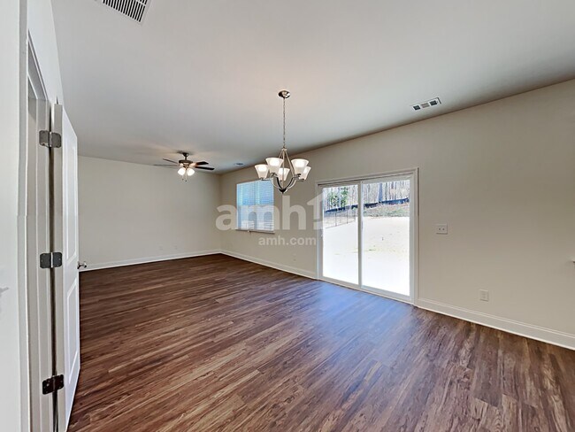 Building Photo - 7059 Creeksong Dr