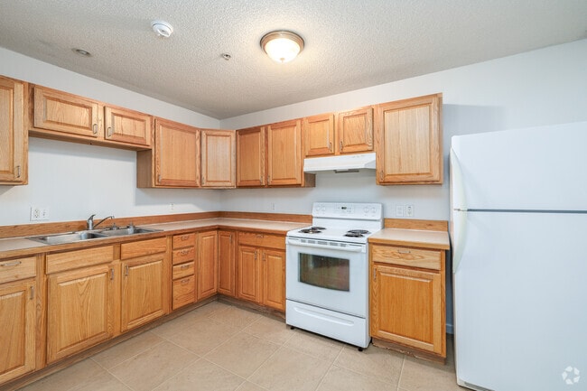 3BR, 1BA - 1,158SF - Kitchen - Montour Family Apartments