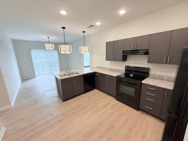 Kitchen & Living Room - Plaza at Central Greens