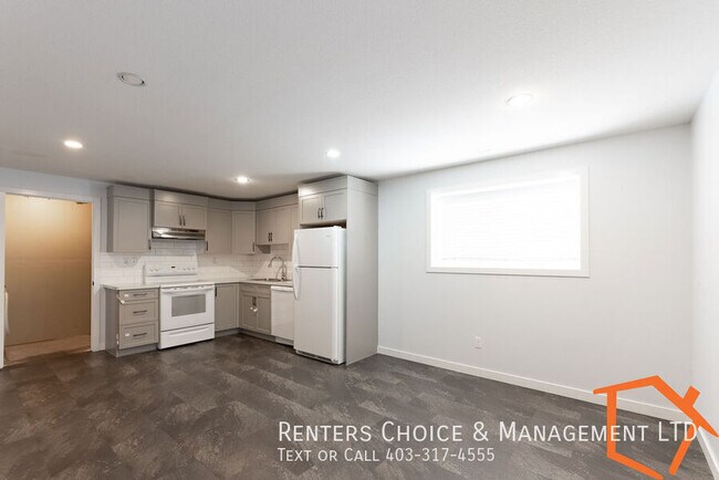 Photo du bâtiment - 2 bedroom Basement Suite, IMPROVED PRICE, Assigned Parking,