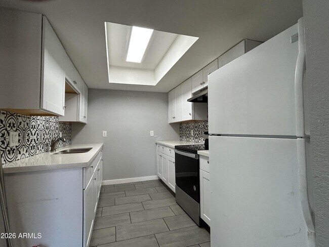 Foto del edificio - 9618 N 5th St