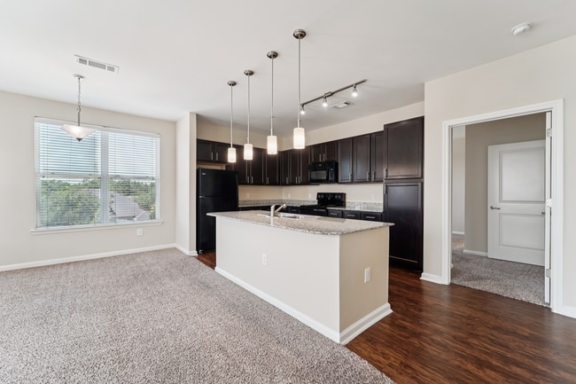 Building Photo - SYNC at Harmony