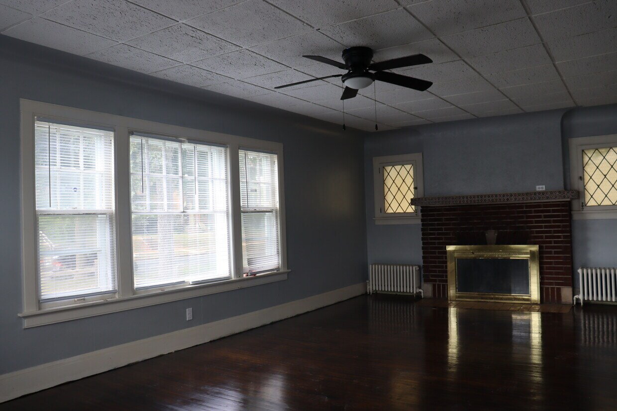 Living room with fireplace - 4730 W Center St