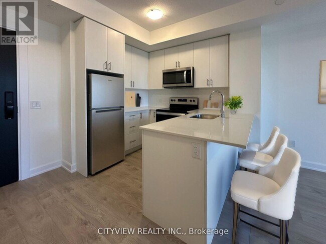 Photo du bâtiment - 3220-3220 William Coltson Ave
