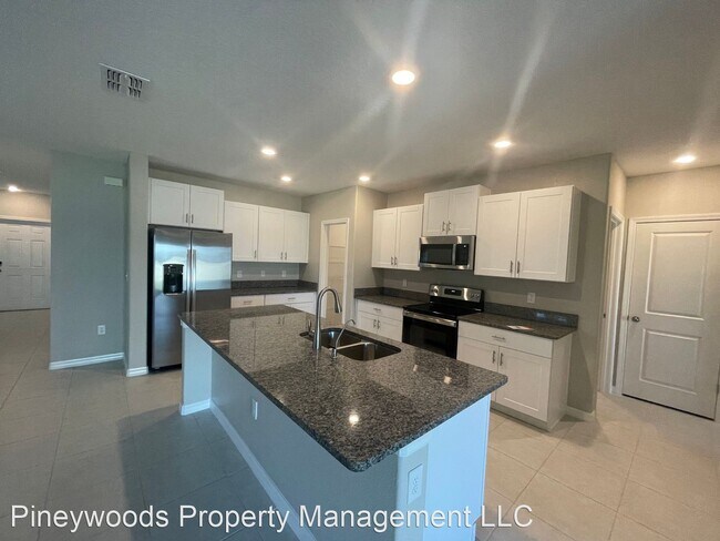 Foto del edificio - 6 br, 3 bath House - 7244 Camp Island Avenue