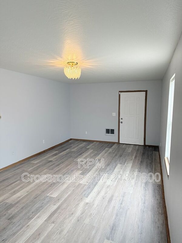 Foto del edificio - 6259 E 11th St