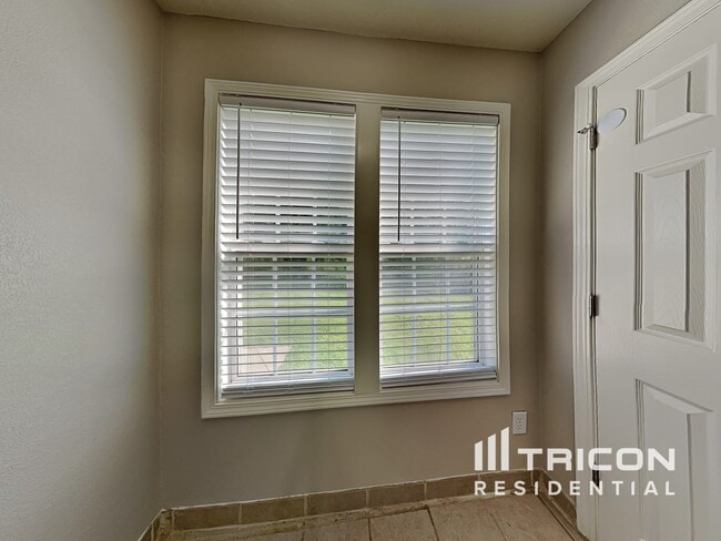 Building Photo - 9312 Tiger Lily Ln