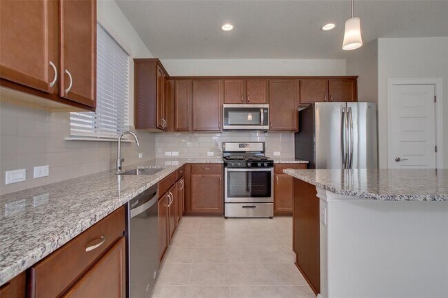 Building Photo - 9311 Gynerium Dr