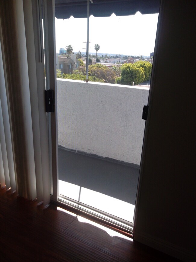 Balcony with view of city - 1427 Saltair S Ave