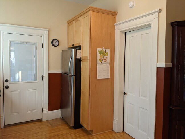 Kitchen refrigerator back door and door to the 2nd bedroom - 2532 Bryant Ave S
