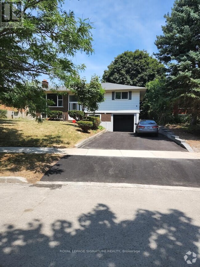 Building Photo - 406 Tamarack Dr