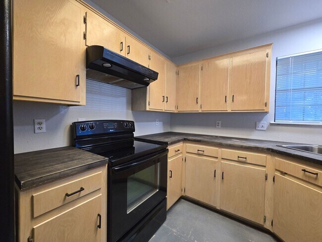 Building Photo - NEW IN MANAGEMENT & RENT REDUCTION - AVAILABLE NOW!