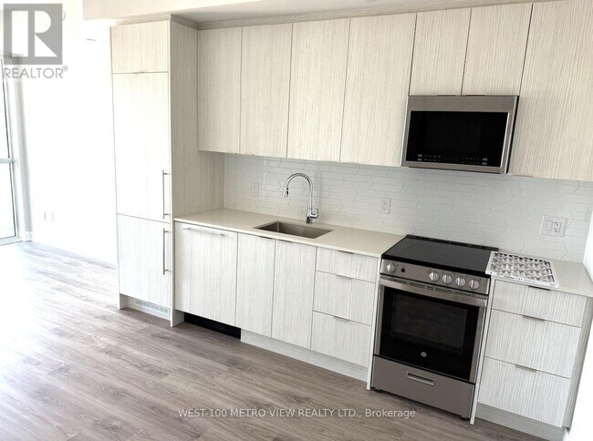 Photo du bâtiment - 430-4430 Square One Dr