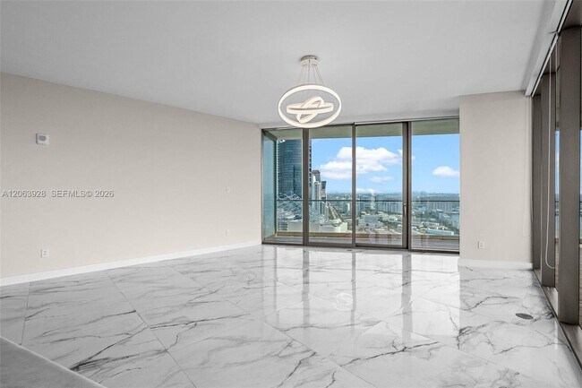 Building Photo - 18975 Collins Ave