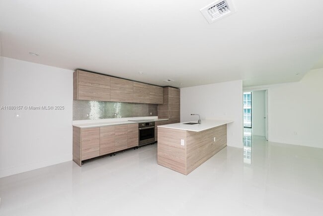 Building Photo - 1300 S Miami Ave